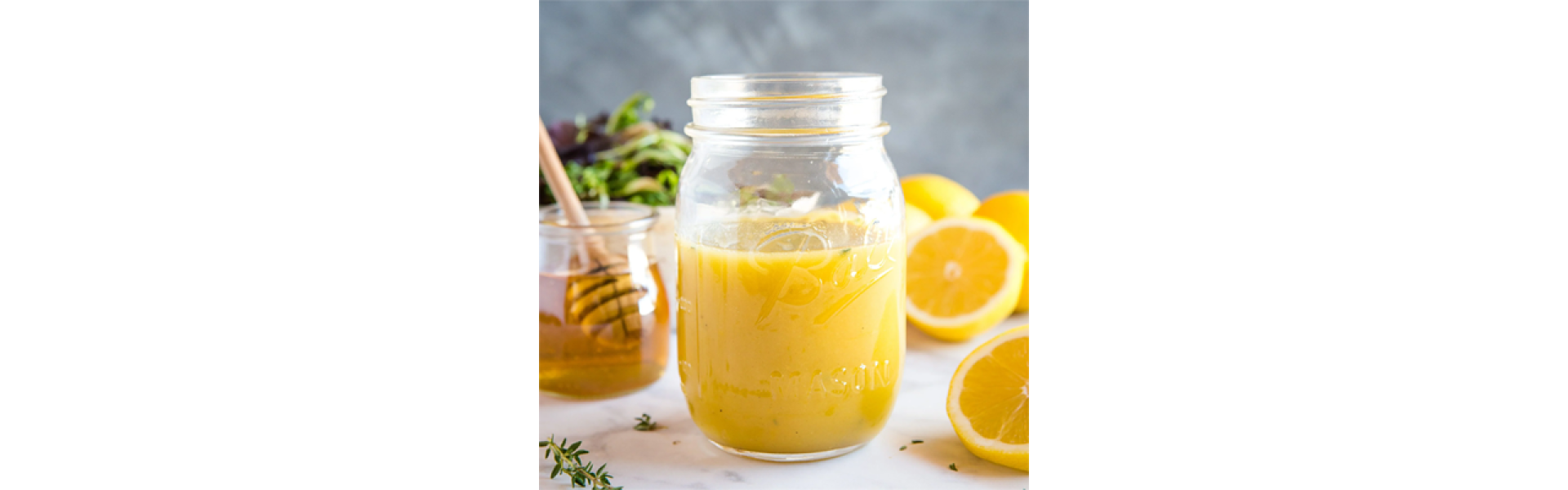 https://whitewaterhoney.com/image/cache/catalog/Blog/honeylemonshallotdressing-1920x600.png